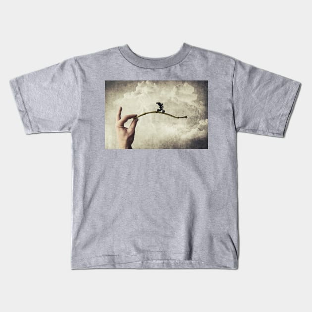 balance boy Kids T-Shirt by psychoshadow